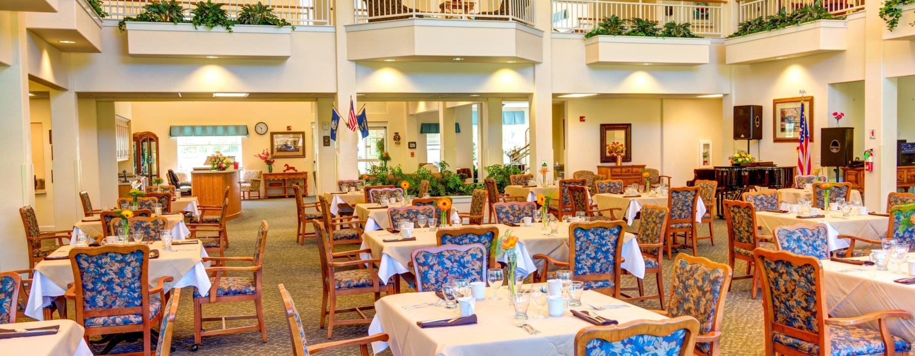 a large room with tables and chairs